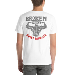 Broken Pieces Built Muscle T-Shirt – Motivational Gym Wear by TeeFlowUSA Unisex t-shirt